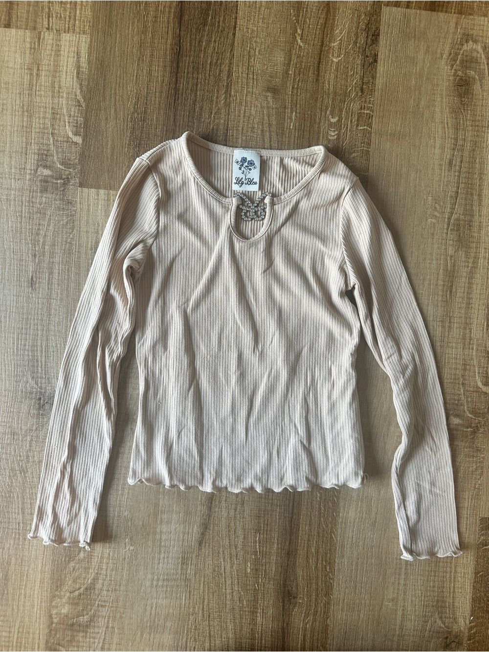 Lily Bleu Long-Sleeve Ribbed Cutout Top in Cream with butterfly gem